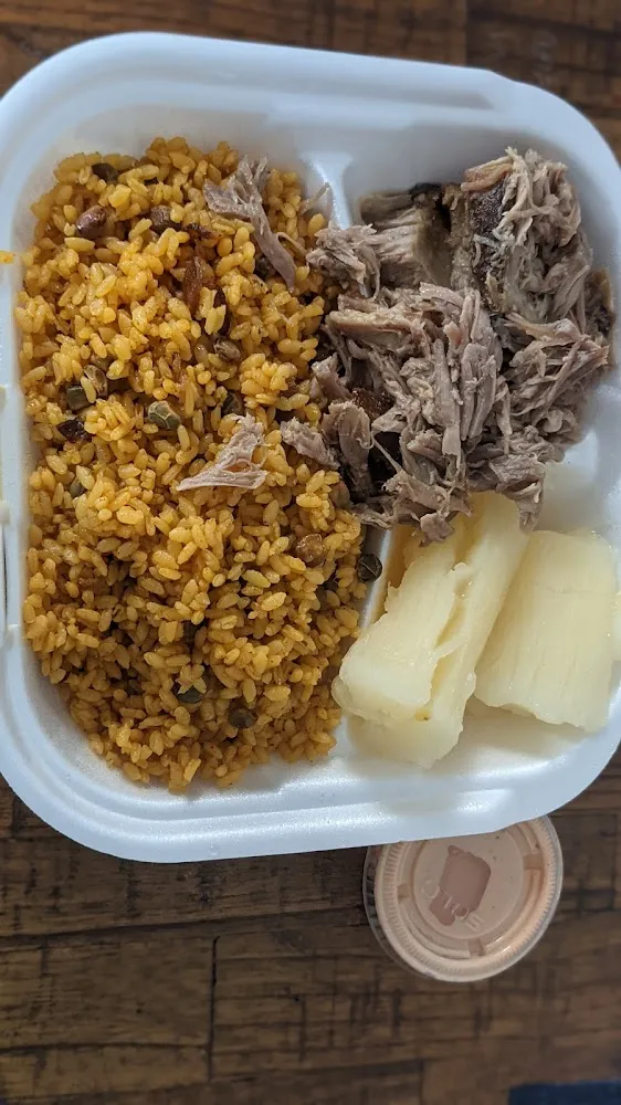 Arroz Con Gandules Lechón Y Guineas En Escabeche